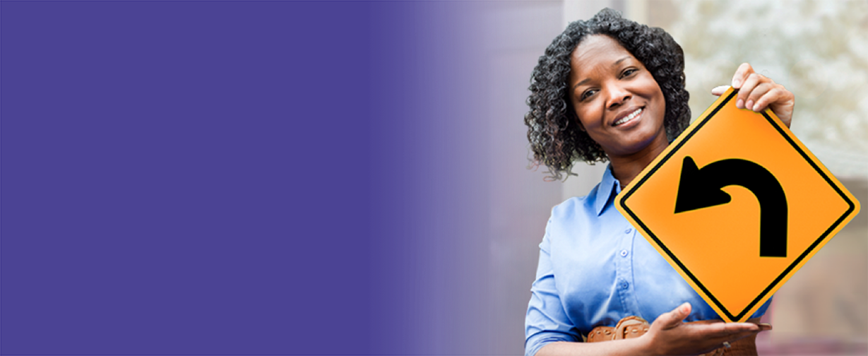 Woman holding an arrow sign